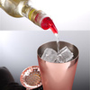 Rote Ausgießerflasche